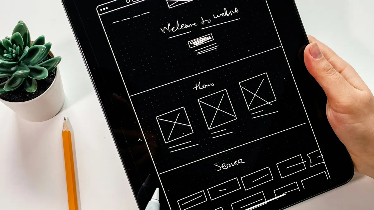 a person holding a tablet